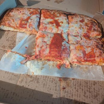Slices Pizza by Tony - I had devoured half of this baby before I remembered to take a photo! - Pizza Near Me - Greensboro, North Carolina Slices Pizza by Tony - I had devoured half of this baby before I remembered to take a photo! - Pizza Near Me - Greensboro, North Carolina