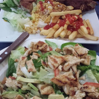 Two Flags - Fried Pork Chops and Salad with chicken & Avocados - Latin American Near Me - Hightstown, New Jersey Two Flags - Fried Pork Chops and Salad with chicken & Avocados - Latin American Near Me - Hightstown, New Jersey
