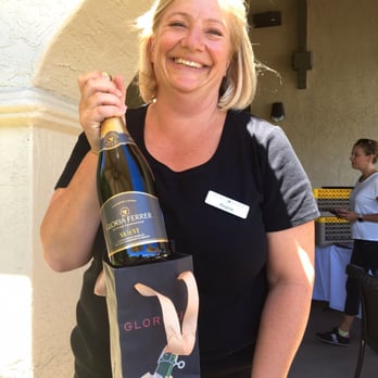 Gloria Ferrer Winery - Regina bags up my $24 Bottle of Va de Vi Sparkling (Rose) Wine - Wineries Near Me - Sonoma, California