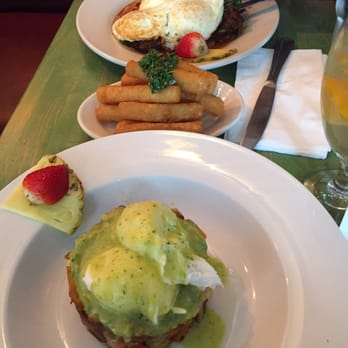 Yuca Bar - Yuca eggs Benedict has shrimp and cilantro hollandaise and he had yummy churrasco and eggs! - Latin American Near Me - New York, New York Yuca Bar - Yuca eggs Benedict has shrimp and cilantro hollandaise and he had yummy churrasco and eggs! - Latin American Near Me - New York, New York