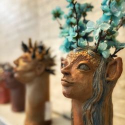 Antiques On Pierce - These strange heads adorn the stairs and several displays. Would love more context!