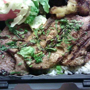 Kachi's Chicken - Grilled pork chops w/ house salad and plantains - Peruvian Near Me - Suitland, Maryland