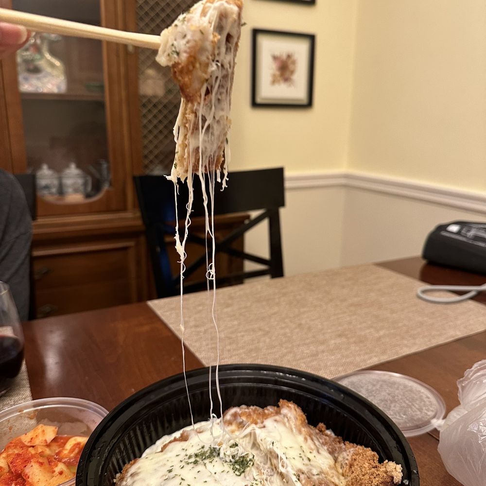 I Am Kimchi - Pork donkatsu showing the stringy cheese. - Korean Near Me - Flushing, New York