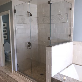 JM Forster Construction - a bathroom with a walk in shower - General Contractors Near Me JM Forster Construction - a bathroom with a walk in shower - General Contractors Near Me