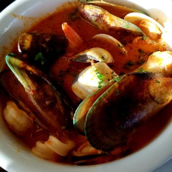 The Dutchie - 424.95 Cioppino. Comes w/a cup of clam chowder (or salad). Also served w/two slices of garlic bread. Highly recommend getting this dish! - Seafood Near Me - Morro Bay, California The Dutchie - 424.95 Cioppino. Comes w/a cup of clam chowder (or salad). Also served w/two slices of garlic bread. Highly recommend getting this dish! - Seafood Near Me - Morro Bay, California