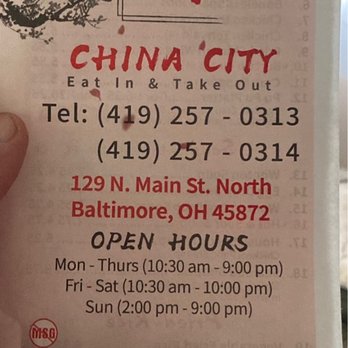 China City - a hand holding up a ticket - Chinese Near Me - North Baltimore, Ohio China City - a hand holding up a ticket - Chinese Near Me - North Baltimore, Ohio