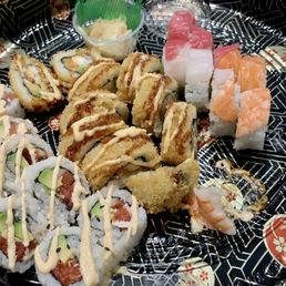 Sushi party tray something or another. I don't know, but it was delicious. Sushi party tray something or another. I don't know, but it was delicious.