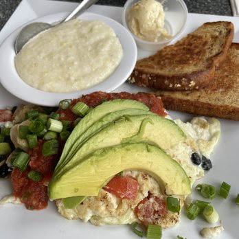 The Blue Hen Cafe - Veggie Omelette (made with requested egg whites only), grits, bread, and that amazing peach butter - Southern Near Me - Saint Augustine, Florida The Blue Hen Cafe - Veggie Omelette (made with requested egg whites only), grits, bread, and that amazing peach butter - Southern Near Me - Saint Augustine, Florida