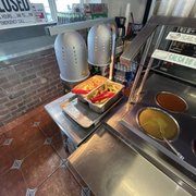 Photo of Colima's Mexican Food - San Diego, CA, United States. Grilled onions and grilled jalapeños included with salsa bar