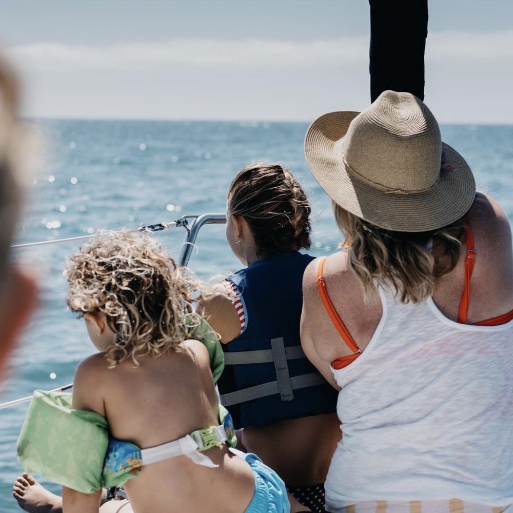 Kiddos checking out the dolphins!! So close to the boat. Kiddos checking out the dolphins!! So close to the boat.