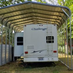 Itiel's Carports & Metal Buildings - 14 ga Round 18'x36x12', 6'ft closed on left sidewall, and extra braces.