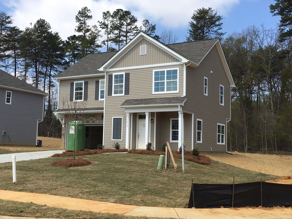 Slide of The Roofing Guy