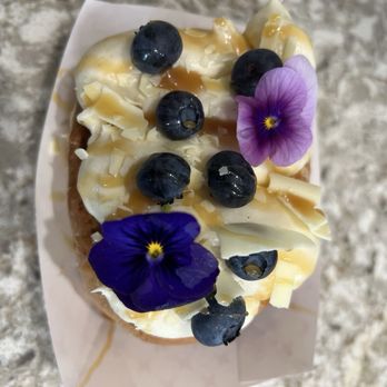 Zerelda's Bistro - DELICIOUS blueberry cinnamon roll with white chocolate frosting and caramel drizzle.... - Cafes Near Me - Juneau, Alaska Zerelda's Bistro - DELICIOUS blueberry cinnamon roll with white chocolate frosting and caramel drizzle.... - Cafes Near Me - Juneau, Alaska