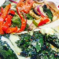 Bongiorno's NY Pizzeria - Vegetarian & White pie slices, plus a few shakes of Parmesan & red pepper flakes