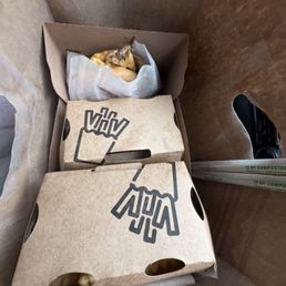 2 fries and chicken sandwich and lettuce wrapped burger and two drinks