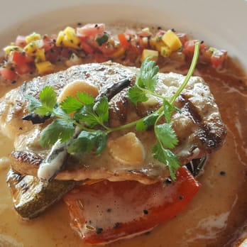 Ocean Grill - Red snapper over grilled veggies, mango salsa, and house sauce - Steakhouses Near Me - Puerto Vallarta, JAL Ocean Grill - Red snapper over grilled veggies, mango salsa, and house sauce - Steakhouses Near Me - Puerto Vallarta, JAL