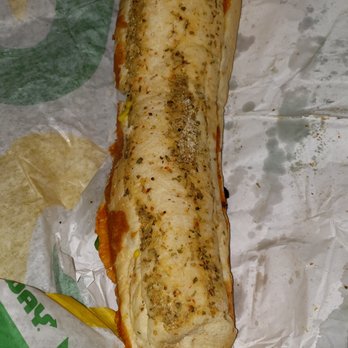 Subway - Subway what is this? Better watch who you hire cause theyre throwing food any kind of way!! And my wrapping was bs too!! - Sandwiches Near Me - Morganfield, Kentucky