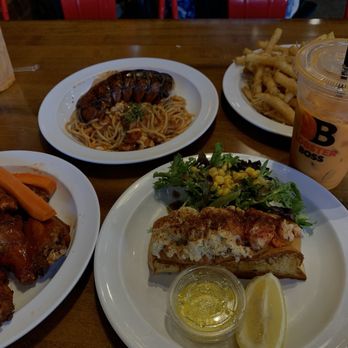 Lobster Boss - 12 piece bone in wings buffalo, garlic parm fries, Lobster pasta, golden butter roll, iced thai tea - Seafood Near Me - Buena Park, California Lobster Boss - 12 piece bone in wings buffalo, garlic parm fries, Lobster pasta, golden butter roll, iced thai tea - Seafood Near Me - Buena Park, California