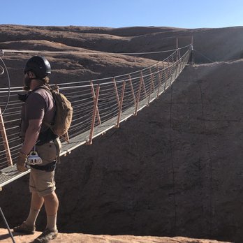 Raven's Rim Adventure Tours - 100ft cable bridge across a deep canyon. - Ziplining Near Me - Moab, Utah