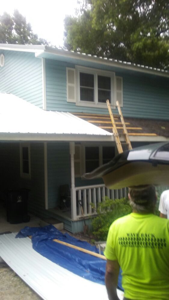 Slide of T&L Metal Roofing Siding Windows