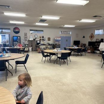 Drifting Sands Cafe - Dining room with kids' corner and TV - American Near Me - Newberry Springs, California Drifting Sands Cafe - Dining room with kids' corner and TV - American Near Me - Newberry Springs, California