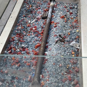 Amsterdam Lounge - Debris in fire pit - Lounges Near Me - Boise, Idaho