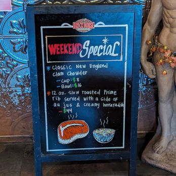 Brick House Restaurant - a statue of a man in a swim suit - Italian Near Me - Elk Grove, California
