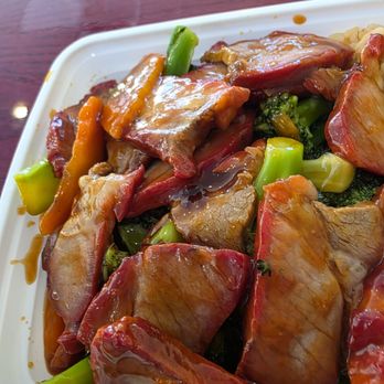 China Wok - Close-up of the Roast Pork in The Roast Pork with Broccoli meal. - Chinese Near Me - Roanoke, Virginia China Wok - Close-up of the Roast Pork in The Roast Pork with Broccoli meal. - Chinese Near Me - Roanoke, Virginia