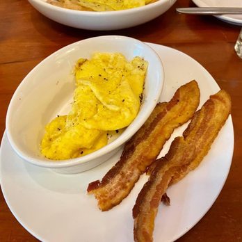 Picnik - Burnet Road - Scrambled eggs and bacon.  The eggs were a wee bit salty on top but overall good.  The bacon was tasty - New American Near Me - Austin, Texas
