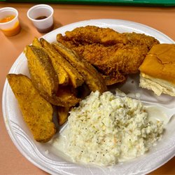 Mountain Fried Chicken - 1 piece breast with slaw, and Potato Wedges.