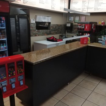 Lupillozz Pizza - a counter with a vending machine - Pizza Near Me - Vista, California Lupillozz Pizza - a counter with a vending machine - Pizza Near Me - Vista, California