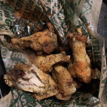 Wingstop - a basket of fried chicken wings - Chicken Wings Near Me - Doraville, Georgia