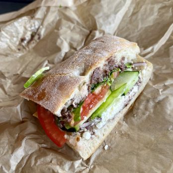 Panino - Santa Ynez - Greek sandwich with Kalamata olive tapenade, feta, and assorted veggies on focaccia bread... - Sandwiches Near Me - Santa Ynez, California Panino - Santa Ynez - Greek sandwich with Kalamata olive tapenade, feta, and assorted veggies on focaccia bread... - Sandwiches Near Me - Santa Ynez, California