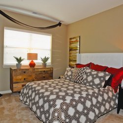 Fenwyck Manor Apartments - Model bedroom with plush carpet and large window
