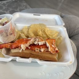 Warm lobster roll with kettle chips and a side of yummy coleslaw. This was a meal around 28.00 dollars.