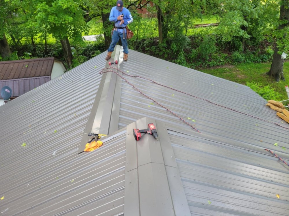 Slide of Benitez Roofing