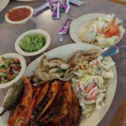 La Hacienda - Quesa Tacos- Barbacoa, grilled onions, guacamole & side green tamale