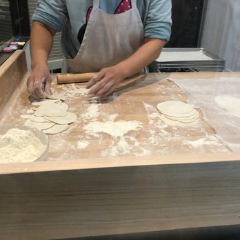 Myungin Dumplings - The lady is making fresh dumplings. - Korean Near Me - Northridge, California Myungin Dumplings - The lady is making fresh dumplings. - Korean Near Me - Northridge, California