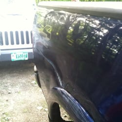 Walt's Service Center - Dent in passenger side of truck.