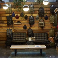 LESS 17 - Herschel bag display.