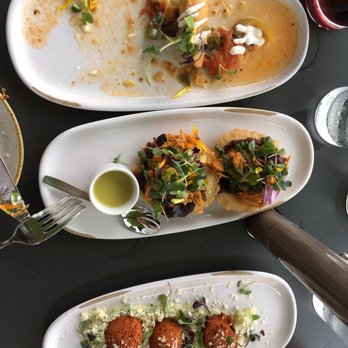 Mayan Cafe - Empanadas, Salbutes, sweet potato fritters. I enjoyed the touch of micro greens and edible flowers. Beautiful and tasty. - Latin American Near Me - Louisville, Kentucky