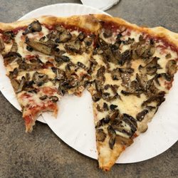 Two slices with mushrooms. (One partially eaten!)
