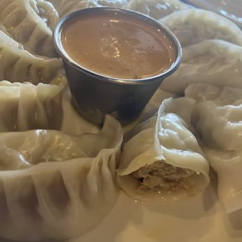 Himalayan Cuisine - Momos: Delicious dumplings filled with ground chicken and spices. Juicy and accompanied by a wonderful dipping sauce. - Indian Near Me - Frisco, Colorado
