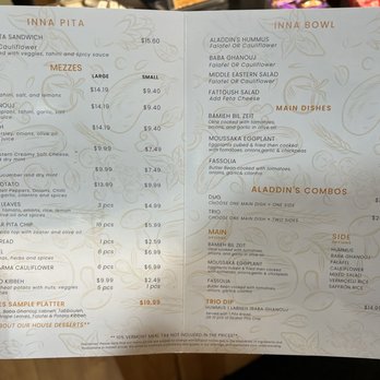 Aladdin - menu as of 11/24/24 - The menu lists various Middle Eastern dishes including hummus, falafel, and pita sandwiches, with options for bowls, mezes, and combos, along with prices. - Falafel Near Me - Stowe, Vermont