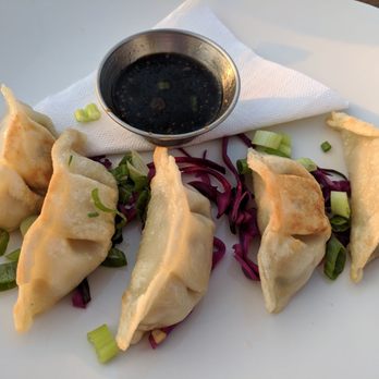 Social Eatery - Coriander chicken dumplings with sesame soy sauce - Bars Near Me - Mississauga, Ontario Social Eatery - Coriander chicken dumplings with sesame soy sauce - Bars Near Me - Mississauga, Ontario