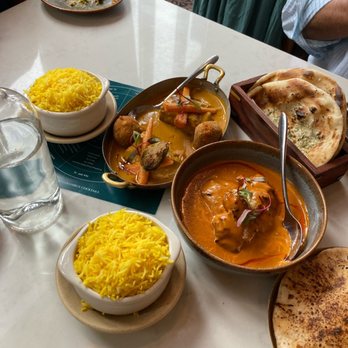 Rooh Columbus - Saffron rice, beef short ribs, butter chicken, garlic naan, and Thai chile and cheese naan. - Indian Near Me - Columbus, Ohio