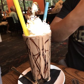Cin Cin Burger BAR - The Kumbayah vodka milkshake that my husband ordered, and our server was nice enough to bring two straws. Delish!! - Burgers Near Me - Winston-Salem, North Carolina Cin Cin Burger BAR - The Kumbayah vodka milkshake that my husband ordered, and our server was nice enough to bring two straws. Delish!! - Burgers Near Me - Winston-Salem, North Carolina