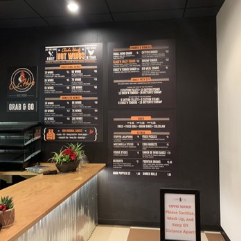Chick'n Headz - Large menu on the wall for you to read while you wait in line. - Chicken Wings Near Me - Bentonville, Arkansas Chick'n Headz - Large menu on the wall for you to read while you wait in line. - Chicken Wings Near Me - Bentonville, Arkansas