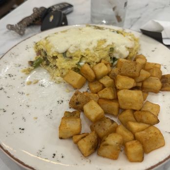 Mornings Breakfast & Brunch - Make your own omelette (partially eaten and Potato's) - Breakfast & Brunch Near Me - Indianapolis, Indiana