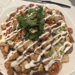 Chicken nachos They charge extra for the chicken Chicken nachos They charge extra for the chicken